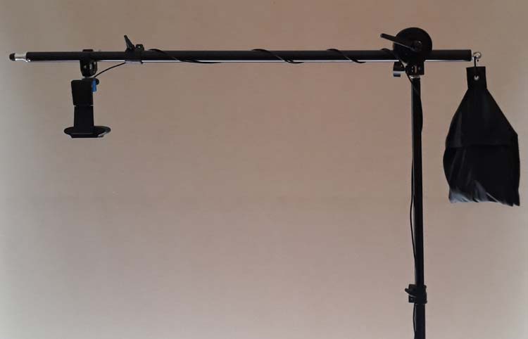 Webcam mounted using a light stand with boom arm