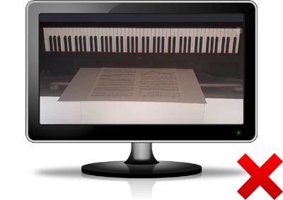 PC monitor showing piano keyboard upside down, not the right way